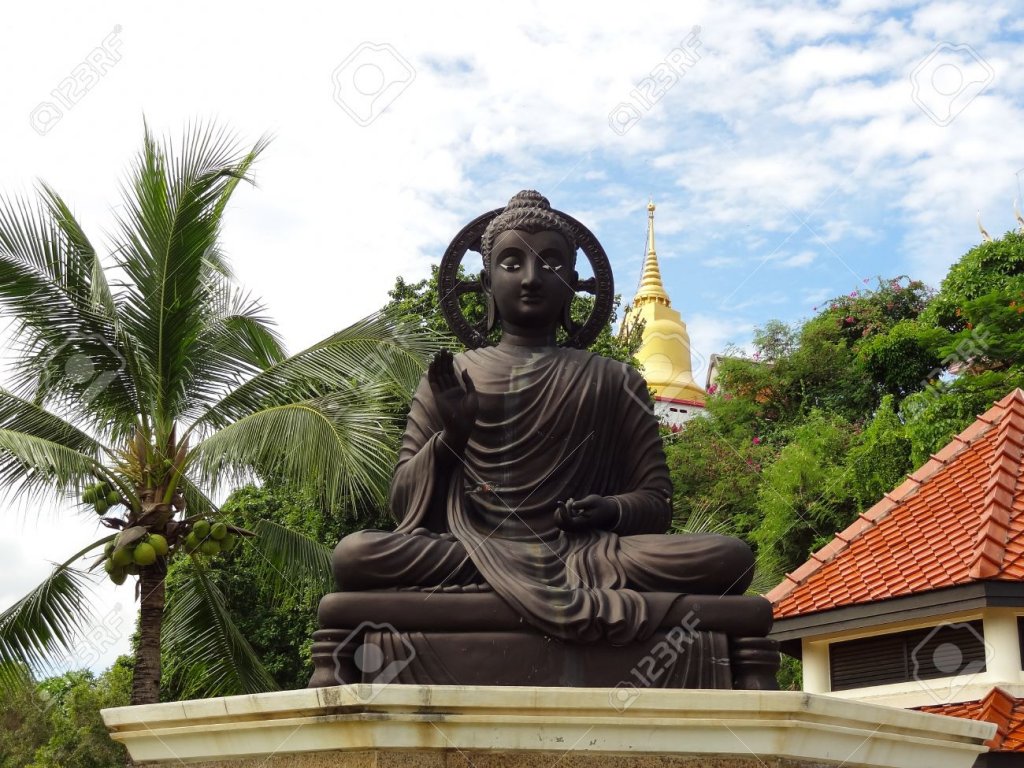 22038108-Buddha-statue-in-Koh-Loy-Sriracha-Thailand-Stock-Photo.jpg