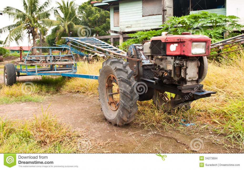 old-farmer-tractor-thailand-34273694.jpg