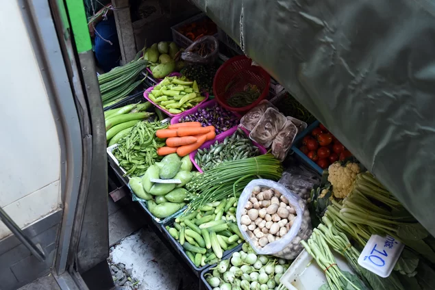 passing-maeklong-railway-market-veggies.jpg